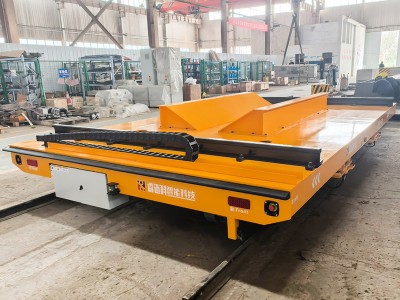 Com triar carregadors per a carretons de transferència elèctrica industrial